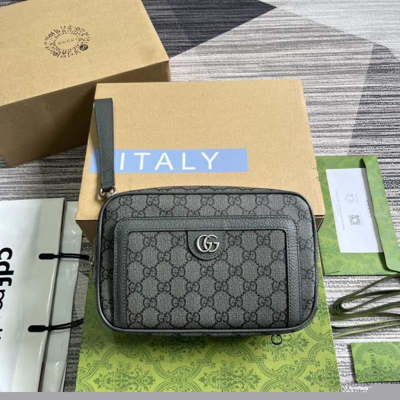 G*u*i clutch bags